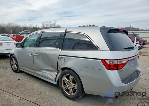 2012 Honda Odyssey Touring z USA, uszkodzony, nr VIN 5FNRL5H9XCB043913